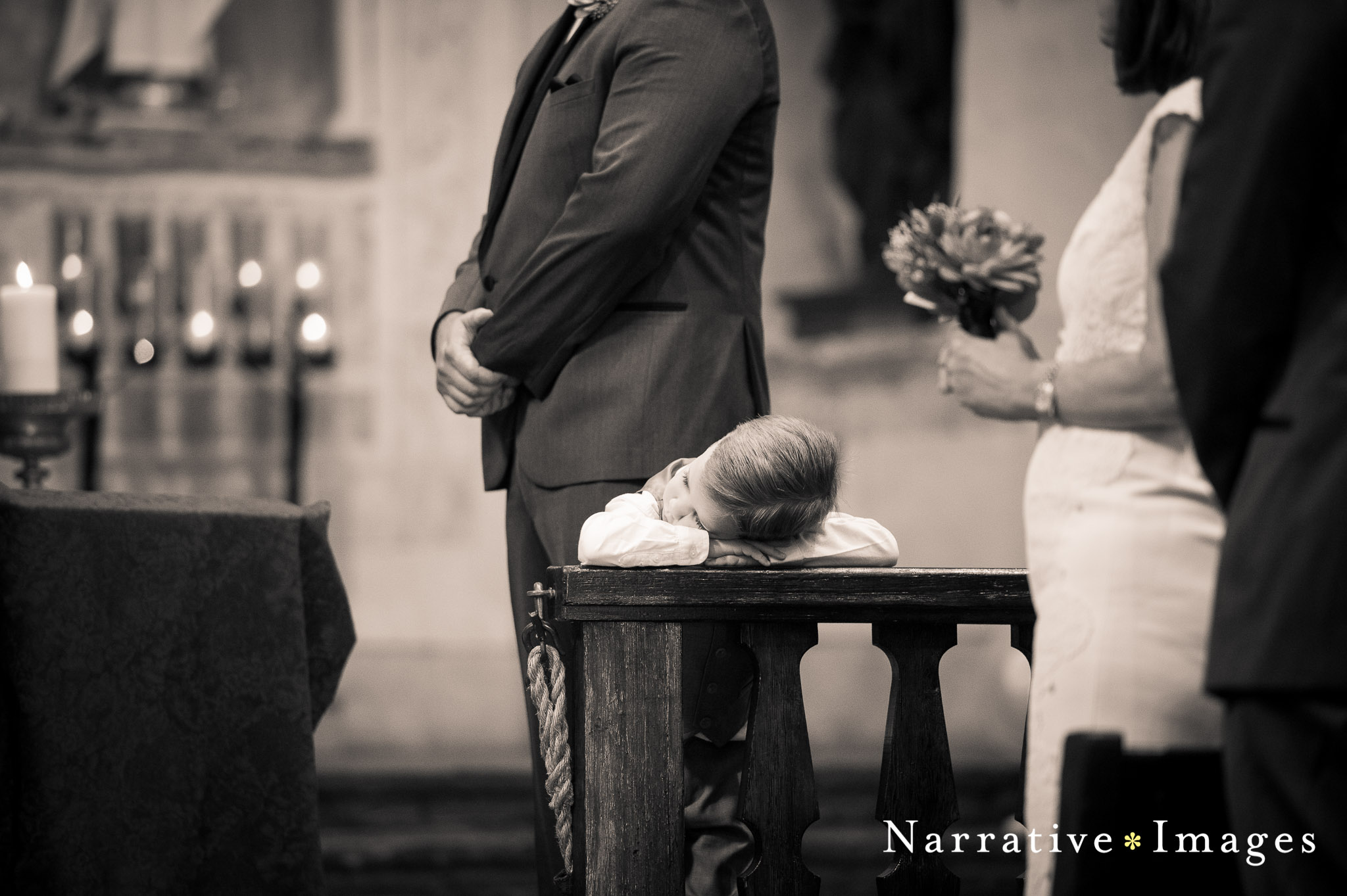 Ring bearer sleeps at Mission Basilica in San Diego