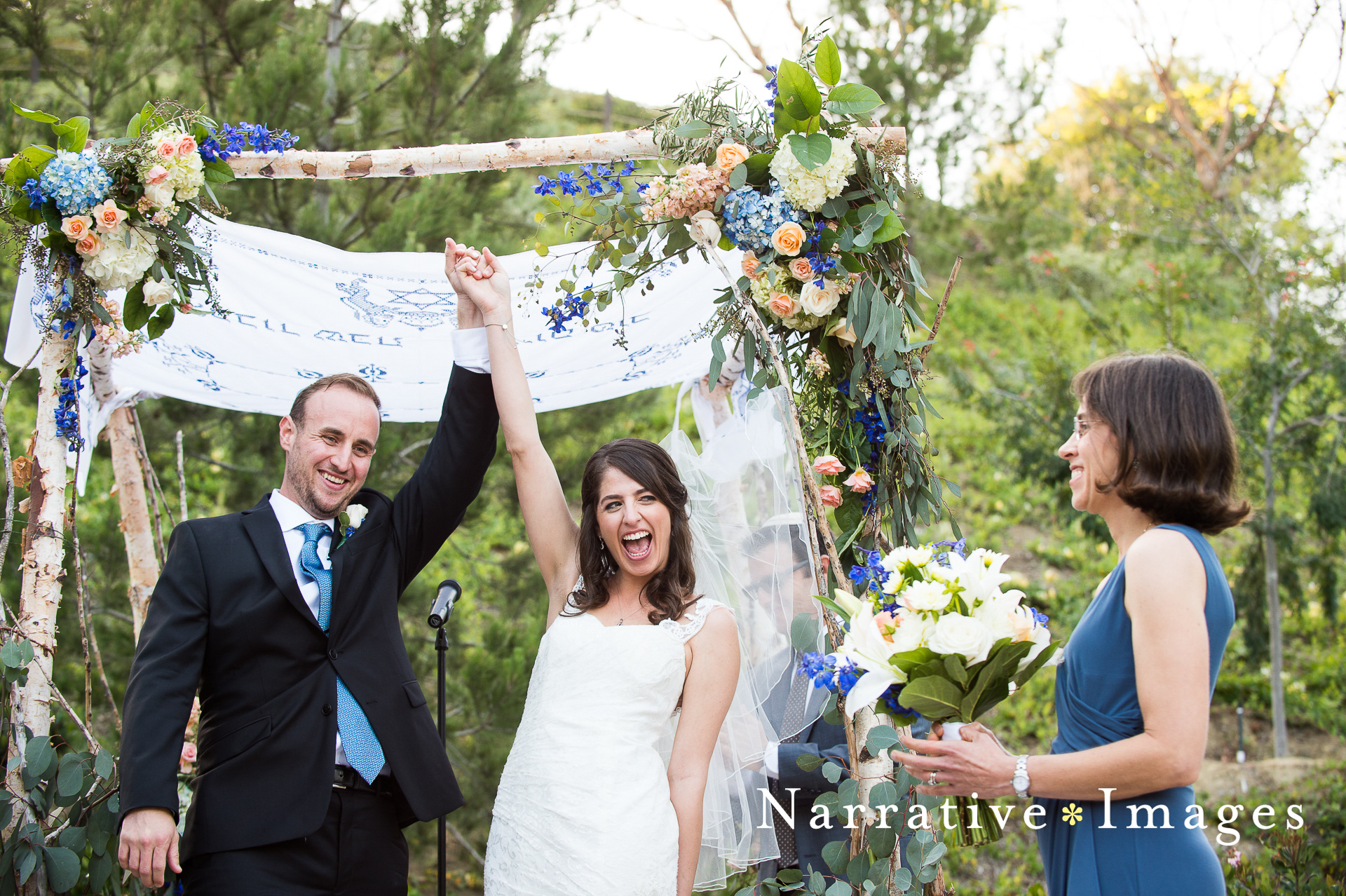 Bride and Groom celebrate after their vows during Jewish wedding ceremony at Japanese Friendship Gardens in Balboa Park