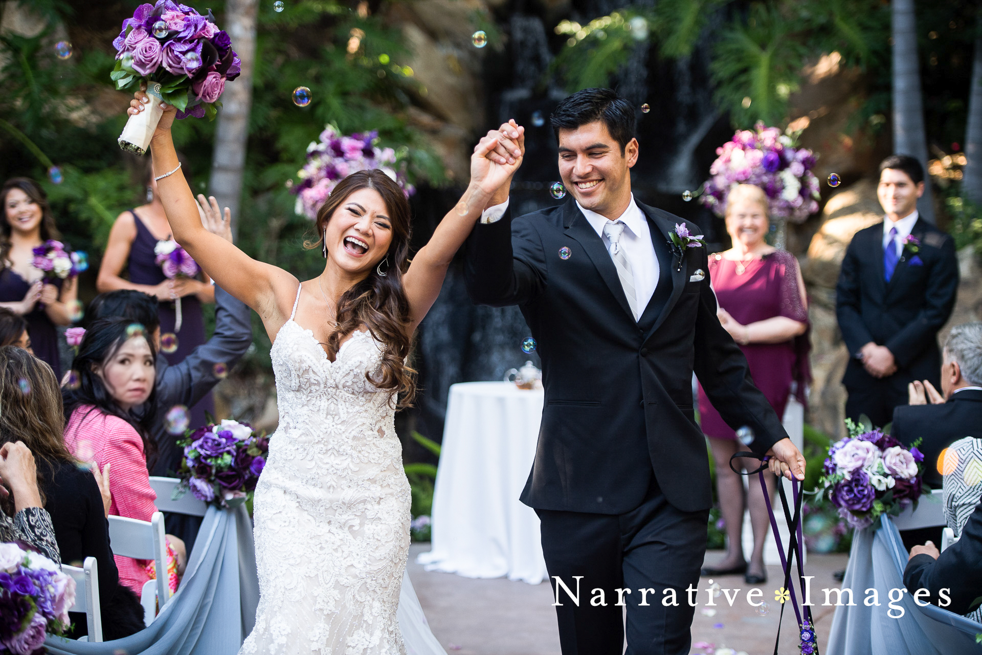 Bride and groom walk down the aisle at Grand Tradition Estate in Fallbrook