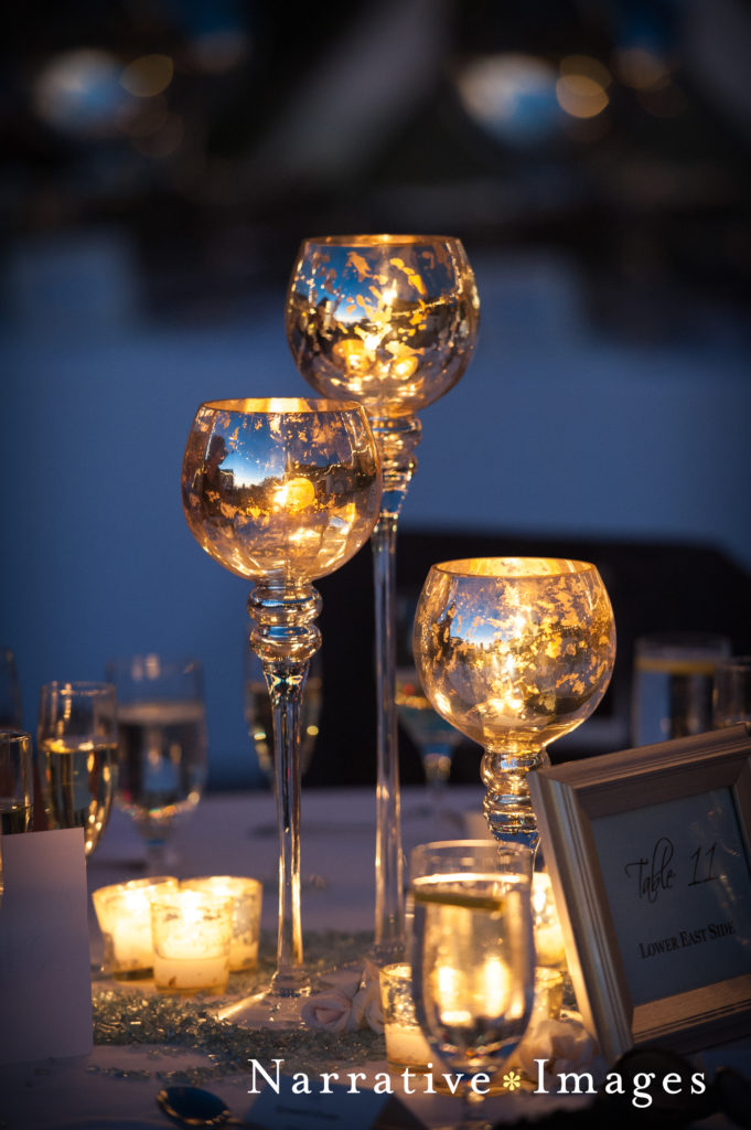 Candle holder centerpieces at wedding at L'Auberge Del Mar