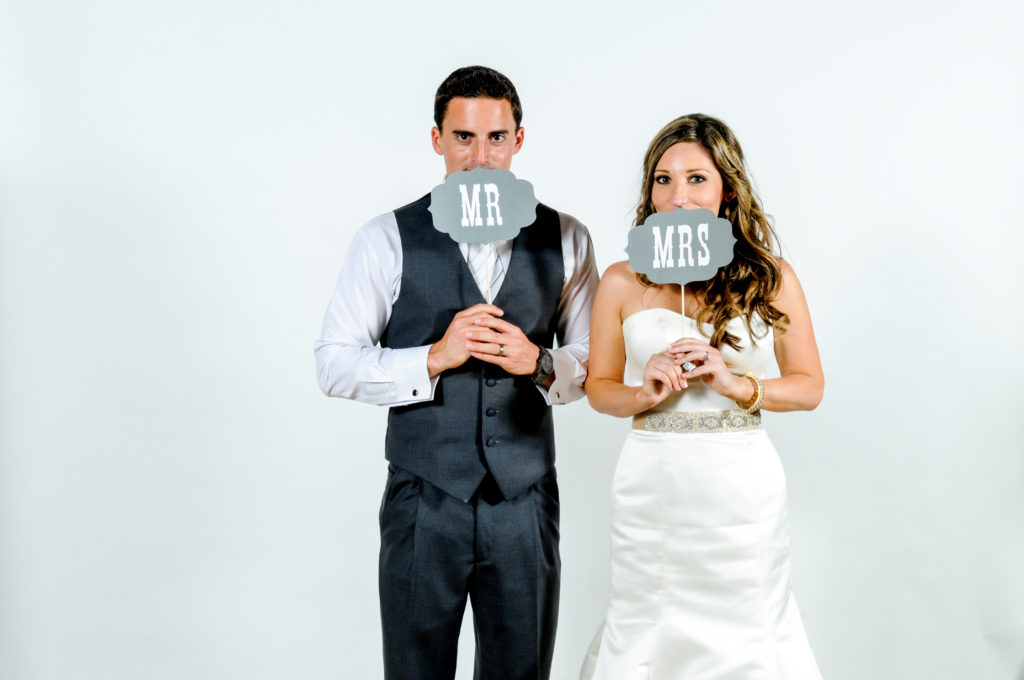 Bride and groom photo booth photo at wedding at Scripps Seaside Forum in La Jolla, California