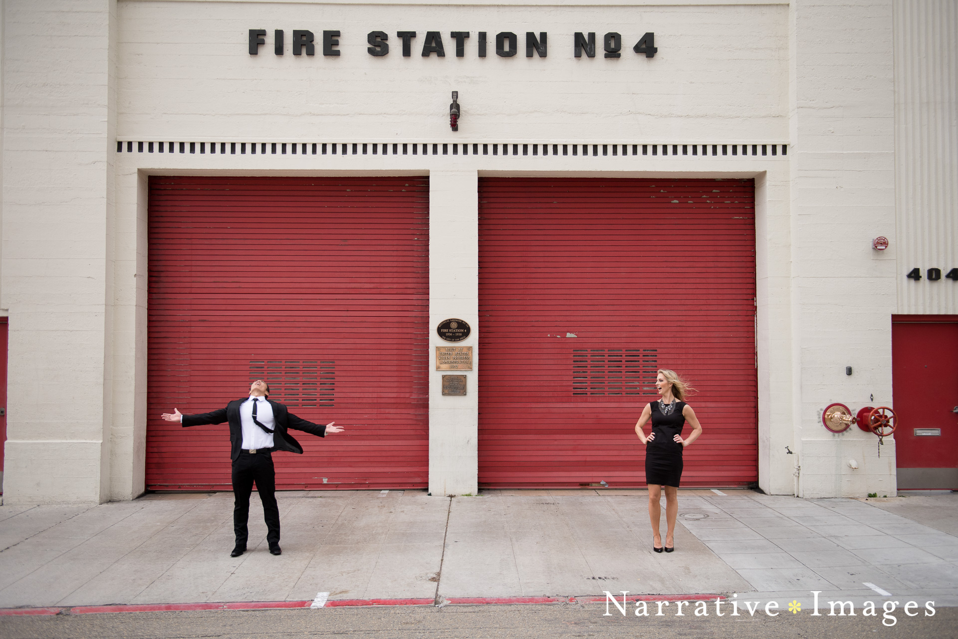 engaged couple in front of the fire station downtown san diego