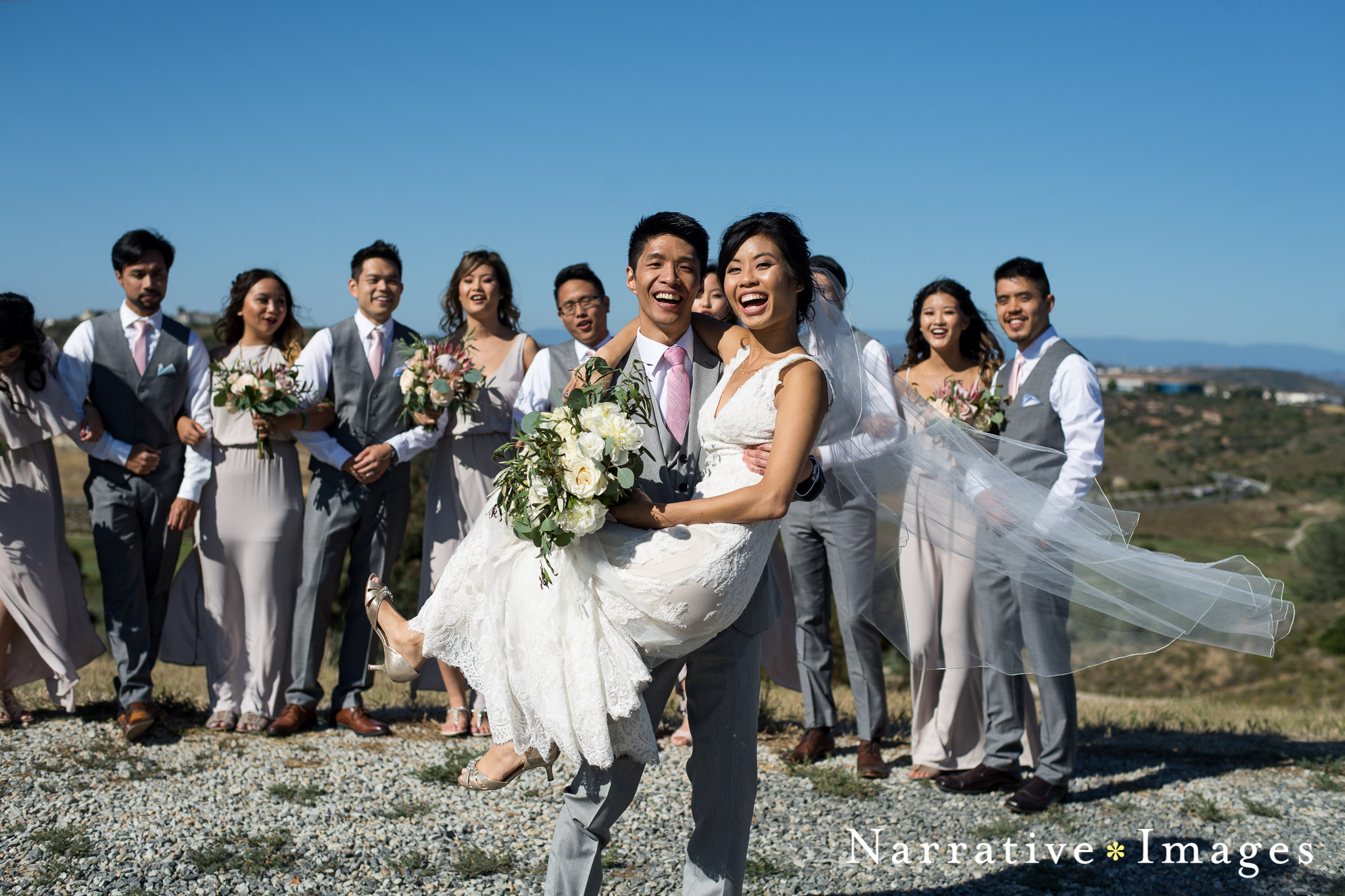 wedding party photo with bride and groom outdoors at the crossings in Carlsbad